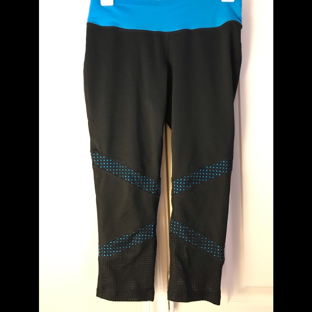Ideology yoga capri pants. Black with blue detail and mesh at bottom. Small